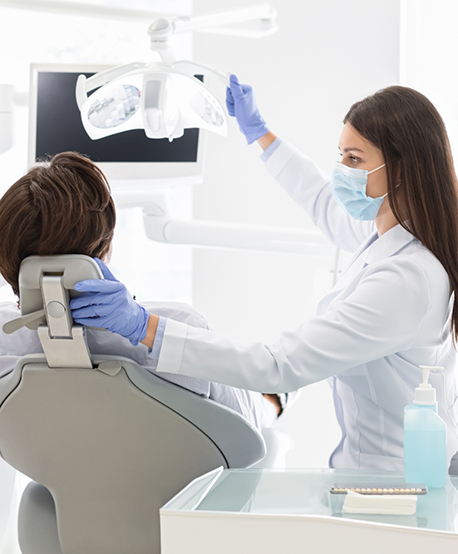 Dentist preparing to give a patient a dental exam